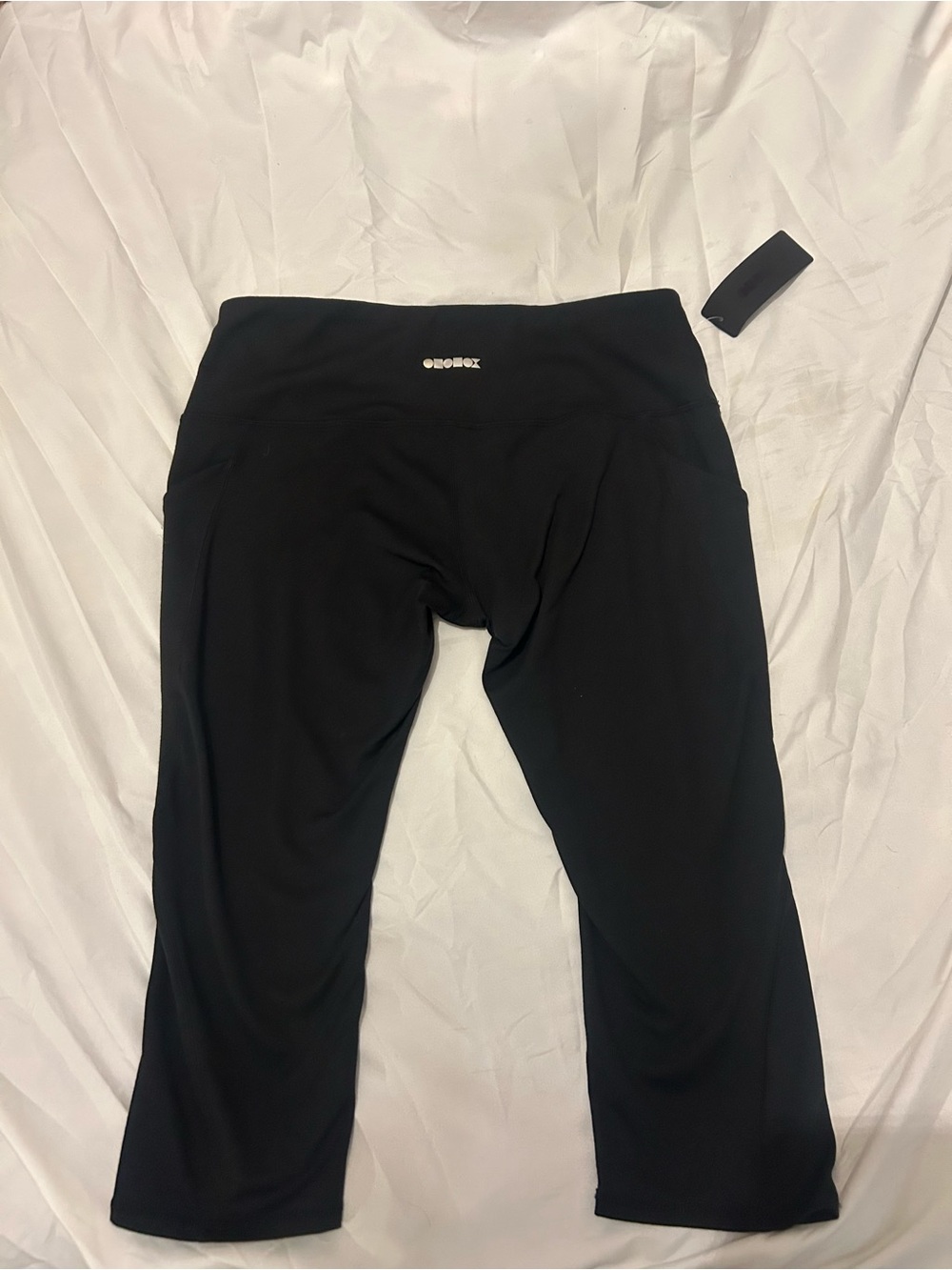 Women's Black Capri Leggings with Subtle Back Logo